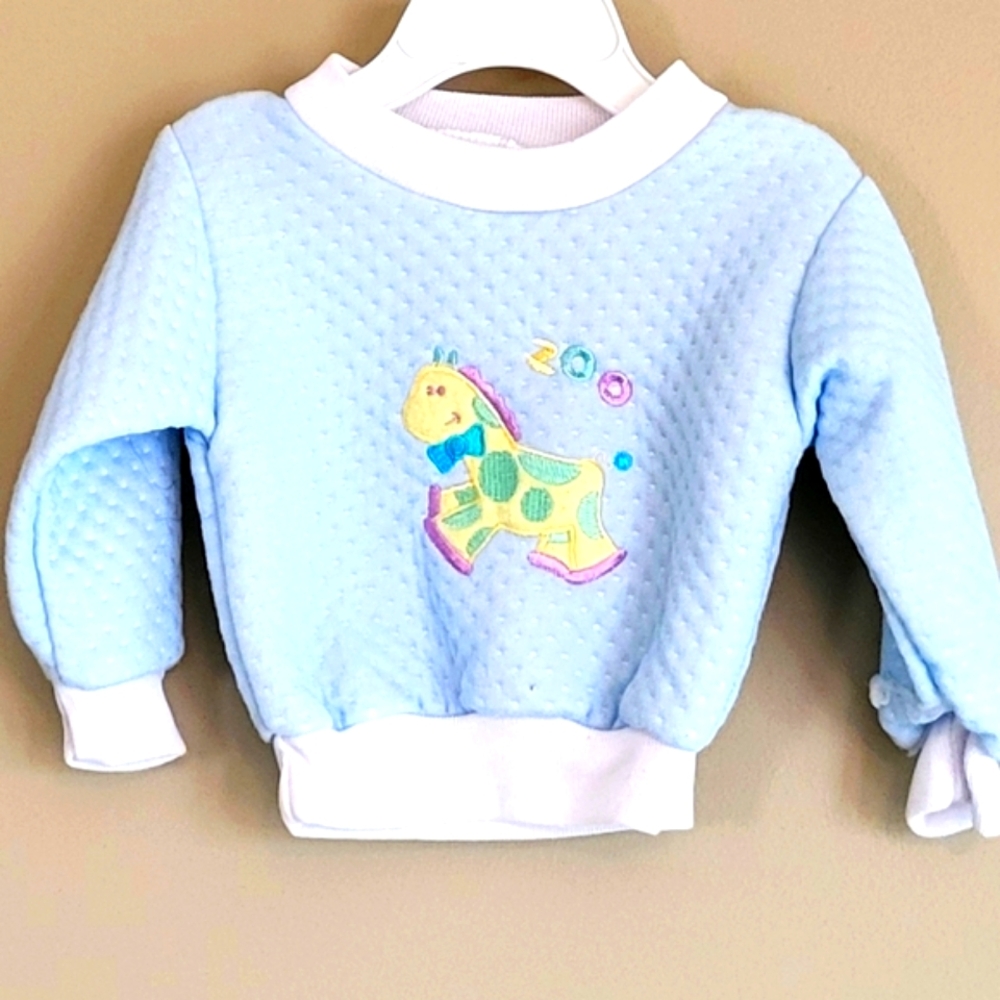 Vintage light blue embrodiered baby sweatshirt.